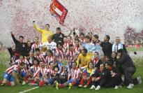 Atletico stun Real in extra-time to lift title