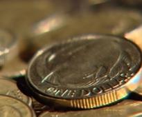 NZ dollar drops to eight month low