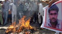 State funeral for 'spy' after death row bashing