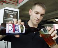 Craft breweries selling beer aged on baseball bats to raise funds for military families
