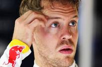Vettel extends Red Bull deal