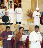 Manmohan inducts eight veterans with an eye on 2014 polls, Kharge made Railways Minister