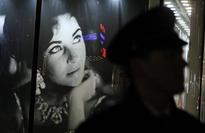 Elizabeth Taylor's first wedding dress up for auction