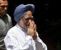 PM Manmohan Singh takes oath as Rajya Sabha member