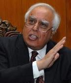 Sibal releases postage sta...