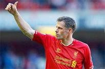 Liverpool's Carragher bows out on high