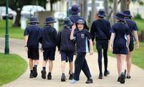 St Mary's pupils, parents and teachers march in Queens Park