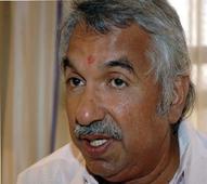 Kerala CM Oomen Chandy dismisses two staff members from CMO