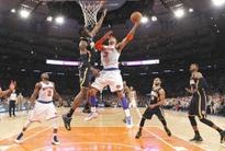 Anthony helps Knicks down Pacers