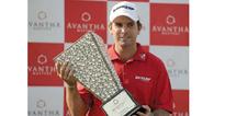Plucky Aiken holds firm for three-stroke victory in India