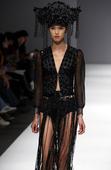 Models present creations in 1st China Graduate Fashion Week in Beijing