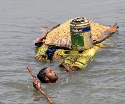 Floods ravage Bihar, Assam, Bengal; train services hit Floods ravage Bihar, Assam, Bengal; train services hit