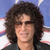 Howard Stern plays babysitter to a rowdy bulldog