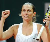 Vinci upsets top-seed Kvitova