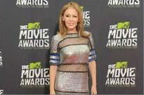 Kylie Minogue 'very much in love'