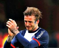 Tearful Beckham Bids Farewell to Paris