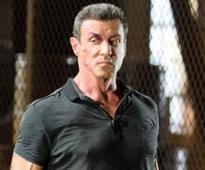 Sly shines in brainless, beefy film