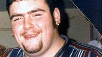 Body discovered in woods identified as man missing for 14 years