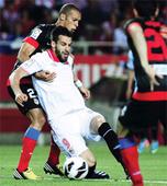 Atletico defeat Sevilla to keep pace with Real