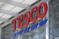 Tesco Swaps Global Aspirations for Giraffe Amid Profit Slide