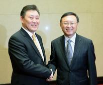 State councilor meets Mongolian deputy PM