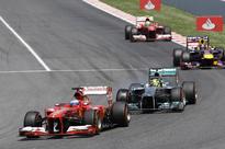 Spanish Grand Prix: Home favourite Fernando Alonso wins amid bedlam in Barcelona