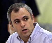 Musical chairs at UPA2 dinner: Omar Abdullah stood waiting as Amar Singh grabs seat next to Sonia
