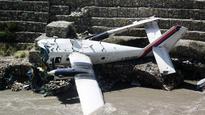 Plane skids into river after brakes fail