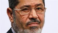 Egypt's Mursi brings more Islamists into cabinet