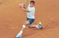 Ruthless Nadal routs Raonic