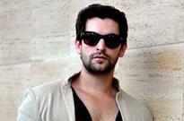 Neil Nitin Mukesh and Richa Chadda play Holi on film set