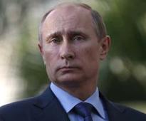 Russian President Vladamir Putin compared to Pope John Paul II