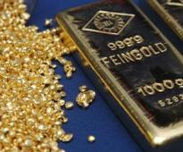 Gold edges higher