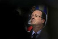 French President Francois Hollande signs gay marriage into law