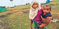 Distrustful Rohingya Muslims resist massive cyclone evacuation