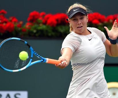 American teen Anisimova stuns Wang, Tomic crashes out American teen Anisimova stuns Wang, Tomic crashes out