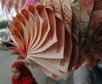 Rupee rises; dollar inflows cushion it in March quarter