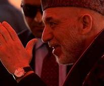 Afghanistan President Hamid Karzai in India; to meet Prime Minister Manmohan Singh today