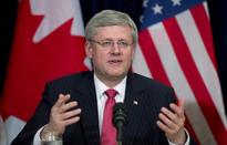 Canada PM defends tar sands pipeline plan, saying oil will come into U.S. anyway