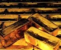 Gold, silver prices fall to record low on strengthening dollar
