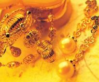 Indian gold futures edge lower  Wednesday near 19 months lowest level