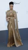 PIX: Aishwarya glams up in gold at Cannes