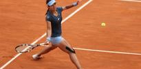 Li downs Zheng, faces Jankovic next
