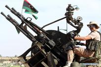 Libyan National Army soldiers take part in military parade