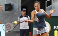 Madison stuns China star Li Na, Serena slogs past Kazakh qualifier