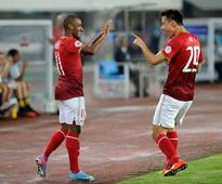 Guangzhou Evergrande reach Asia's last eight