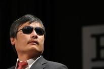 China warns blind dissident ahead of Taiwan trip