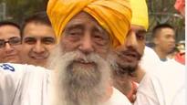 World's oldest runner, 102, finds peace