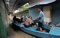 Monsoon floods kill 102 in India, strand pilgrims