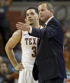 Texas head coach Rick Barnes talks with Javan Felix